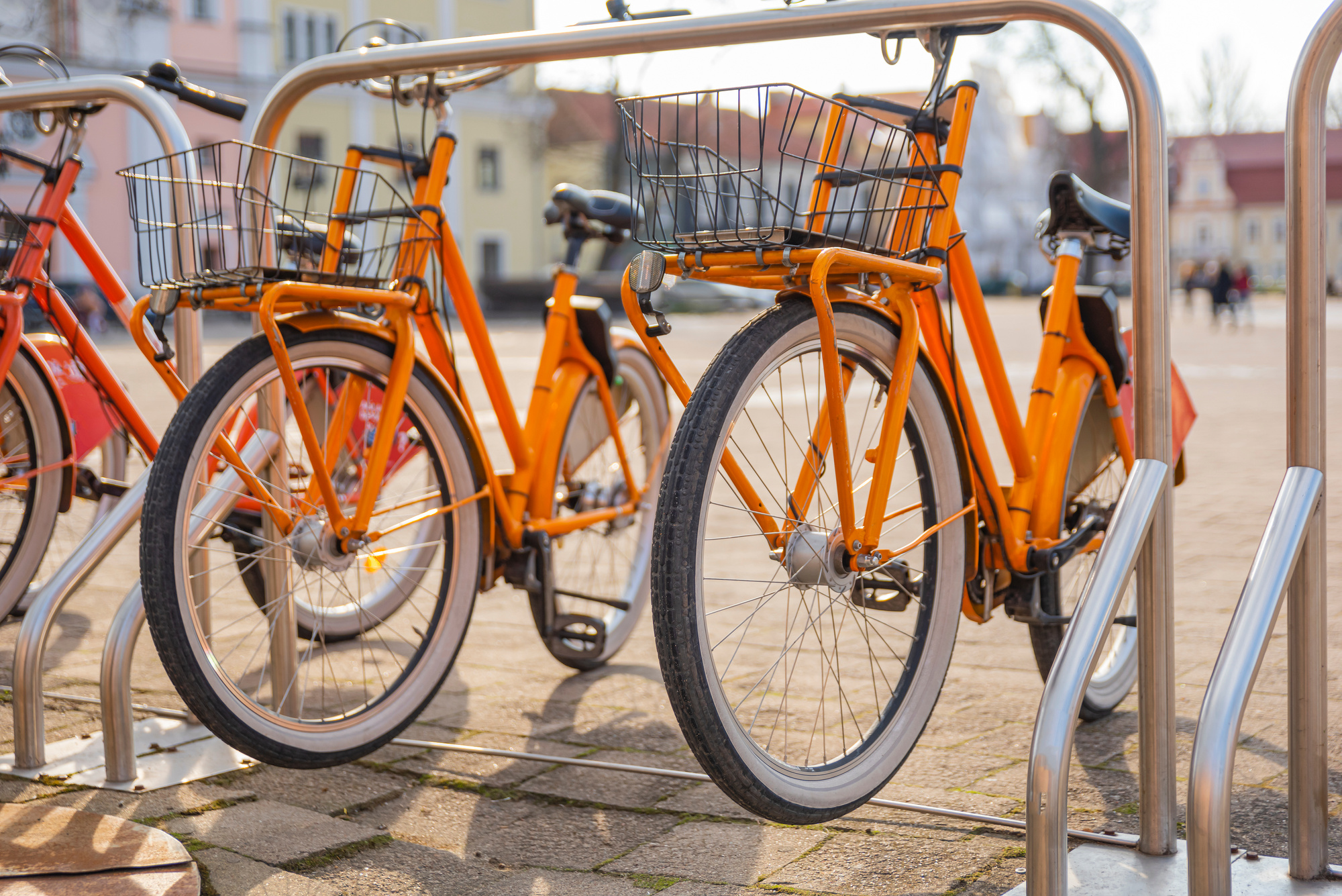 City orange bicycles, ecological transport, bicycle rental for tourists. advertising space